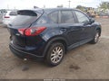 2016 Mazda CX-5 — photo 4 of 16 | VIN JM3KE4CY5G0746514