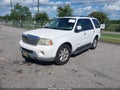 2004 Lincoln Navigator — photo 2 of 11 | VIN 5LMFU28R44LJ26775