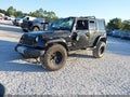 2013 Jeep Wrangler Unlimited — photo 2 of 17 | VIN 1C4BJWEG6DL536759