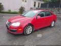 2010 Volkswagen Jetta — photo 2 of 11 | VIN 3VWRZ7AJ3AM042591