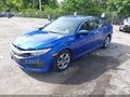 2018 Honda Civic — photo 2 of 16 | VIN 19XFC2F58JE019985