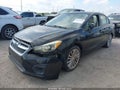 2012 Subaru Impreza — photo 2 of 11 | VIN JF1GJAD65CH006579