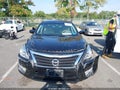 2014 Nissan Altima — photo 11 of 16 | VIN 1N4AL3AP9EN260132