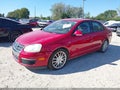 2009 Volkswagen Jetta — photo 2 of 16 | VIN 3VWRA71K79M039785