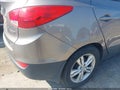 2013 Hyundai Tucson — photo 6 of 11 | VIN KM8JUCACXDU669986