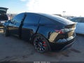 2022 Tesla Model Y — photo 3 of 18 | VIN 7SAYGDEFXNF491496