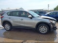 2014 Mazda CX-5 — photo 14 of 17 | VIN JM3KE2BE2E0380584
