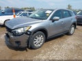 2014 Mazda CX-5 — photo 2 of 17 | VIN JM3KE2BE2E0380584