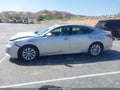 2013 Lexus ES 300h — photo 14 of 16 | VIN JTHBW1GG2D2033753