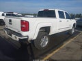 2015 GMC Sierra — photo 4 of 16 | VIN 1GT120E82FF622070
