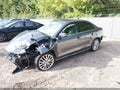2014 Volkswagen Jetta — photo 2 of 17 | VIN 3VWLL7AJ4EM441054