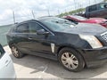 2016 Cadillac SRX — photo 13 of 16 | VIN 3GYFNBE30GS576162