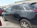 2016 Cadillac SRX — photo 14 of 16 | VIN 3GYFNBE30GS576162