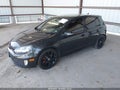 2013 Volkswagen GTI — photo 2 of 12 | VIN WVWHV7AJ8DW128929