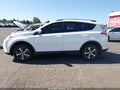 2017 Toyota RAV4 — photo 14 of 16 | VIN JTMRFREV8HD204175