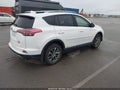 2018 Toyota RAV4 Hybrid — photo 4 of 16 | VIN JTMRJREV5JD158938