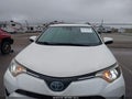 2018 Toyota RAV4 Hybrid — photo 6 of 16 | VIN JTMRJREV5JD158938