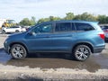 2016 Honda Pilot — photo 14 of 17 | VIN 5FNYF6H82GB071517