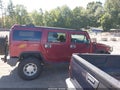2003 Hummer H2 — photo 13 of 16 | VIN 5GRGN23U63H142075