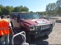 2003 Hummer H2 — photo 1 of 16 | VIN 5GRGN23U63H142075