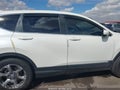 2018 Honda CR-V — photo 13 of 16 | VIN 2HKRW1H51JH519610