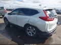 2018 Honda CR-V — photo 3 of 16 | VIN 2HKRW1H51JH519610