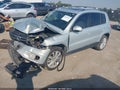 2013 Volkswagen Tiguan — photo 2 of 17 | VIN WVGAV3AX2DW563438