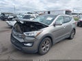2016 Hyundai Santa Fe — photo 2 of 17 | VIN 5XYZU3LB3GG334831