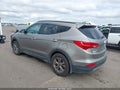 2016 Hyundai Santa Fe — photo 3 of 17 | VIN 5XYZU3LB3GG334831
