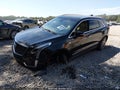 2024 Cadillac XT5 — photo 2 of 16 | VIN 1GYKNCRS1RZ742734