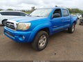 2009 Toyota Tacoma — photo 2 of 16 | VIN 3TMLU42N49M034342