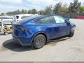 2026 Tesla Model Y — photo 4 of 13 | VIN 7SAYGDED7TF611816