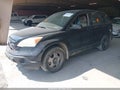 2009 Honda CR-V — photo 2 of 16 | VIN 3CZRE38339G703622
