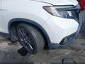 2021 Honda Passport — photo 12 of 18 | VIN 5FNYF7H55MB010881