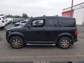 2006 Honda Element — photo 14 of 16 | VIN 5J6YH28736L012010