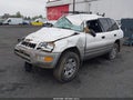 2000 Toyota RAV4 — photo 2 of 16 | VIN JT3HP10V1Y0233854
