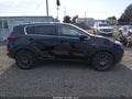 2018 Kia Sportage — photo 13 of 16 | VIN KNDPMCAC7J7349579