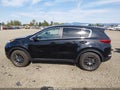 2018 Kia Sportage — photo 14 of 16 | VIN KNDPMCAC7J7349579