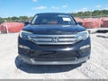 2016 Honda Pilot — photo 13 of 17 | VIN 5FNYF5H88GB017228