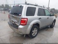 2010 Ford Escape — photo 4 of 11 | VIN 1FMCU0D74AKD12428