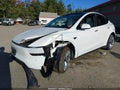 2026 Tesla Model Y — photo 2 of 15 | VIN 7SAYGDEE3TA387417