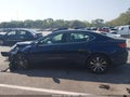 2015 Acura TLX — photo 13 of 15 | VIN 19UUB1F3XFA026905