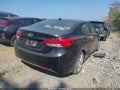 2013 Hyundai Elantra — photo 4 of 11 | VIN 5NPDH4AE8DH411179