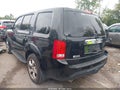 2014 Honda Pilot — photo 3 of 16 | VIN 5FNYF4H57EB009702