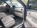 2014 Honda Pilot — photo 5 of 16 | VIN 5FNYF4H57EB009702