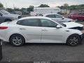 2016 Kia Optima — photo 13 of 16 | VIN 5XXGT4L32GG035330