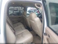 2004 Chevrolet Suburban 1500 — photo 8 of 10 | VIN 3GNFK16T84G322521