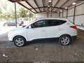 2012 Hyundai Tucson — photo 14 of 16 | VIN KM8JU3AC7CU488648