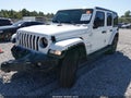 2023 Jeep Wrangler — photo 2 of 16 | VIN 1C4HJXEN5PW702125