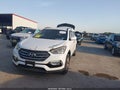 2017 Hyundai Santa Fe — photo 2 of 15 | VIN 5XYZU3LBXHG420350